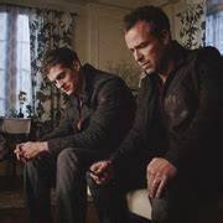 chris argent and isaac sitting next to each other on teen wolf