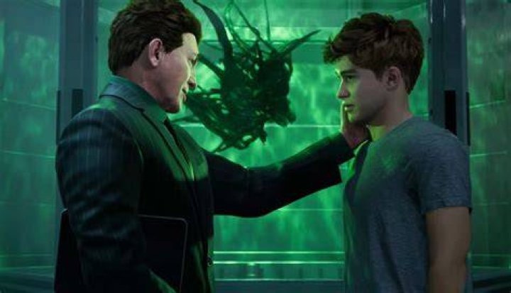 Norman Osborn touching Harry's face in Insomniac's "Spider-Man 2"