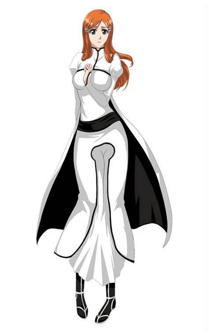 Orihime from Bleach is standing and smiling.