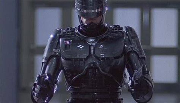 RoboCop and RoboCable in a standoff