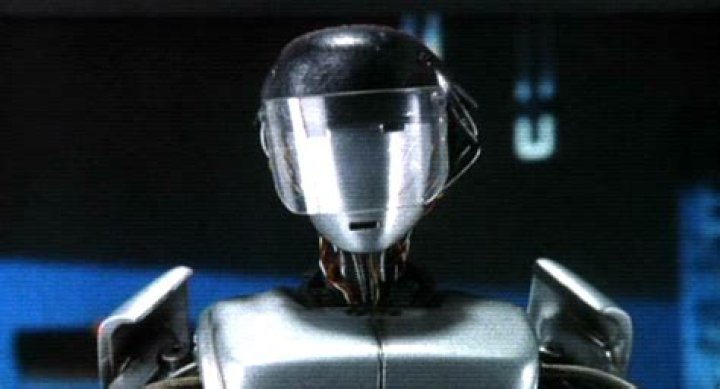 RoboCop prototype pulling his own head off.