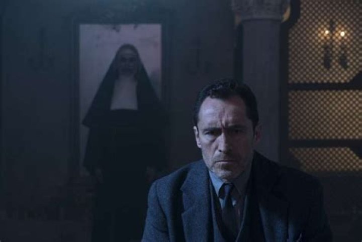 Valak stalking Father Burke in The Nun